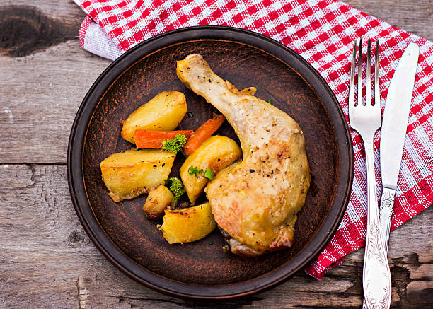 istock Baked chicken and potatoes 473312884