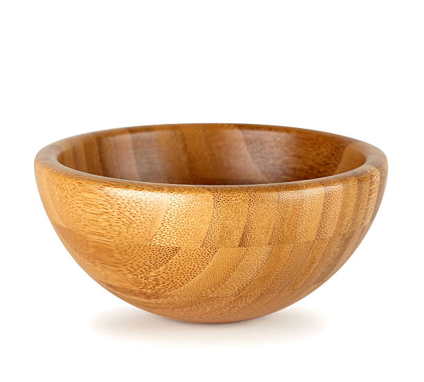 istock Wooden bowl on white background 473314028