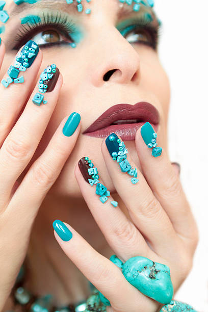 istock Manicure with stones of turquoise. 473314236