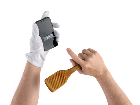 chef hands with kitchen spatula and smartphone, purchase in the online store on an isolated background