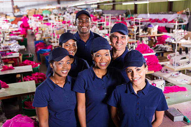 istock group of textile factory workers 473318484
