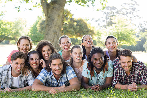 istock Happy friends in the park 473323292