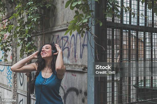 Detail Of A Girl Posing In The City Streets Stock Photo - Download Image Now - 2015, Adult, Adults Only