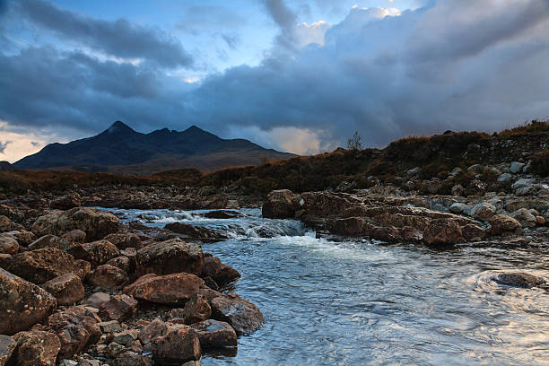 istock Cuillins and a river at sunset in Sligachan 473325606