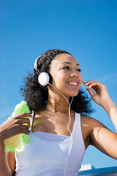 istock Beautiful Woman Relaxing After Workout 473328914