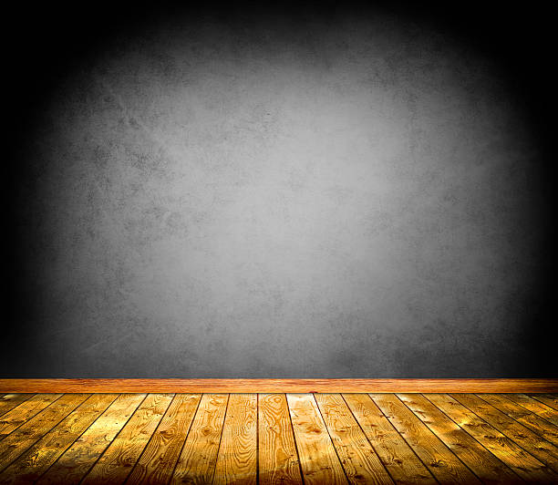 istock Concrete wall and wooden floor background. 473330186