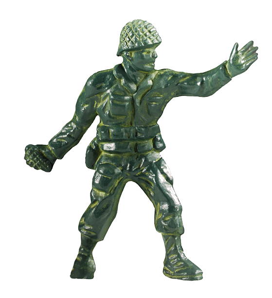 istock Green Soldier Holding Grenade and Gesturing 473335196