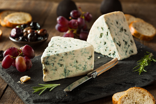 Organic Blue Cheese Wedge with Olives and Grapes