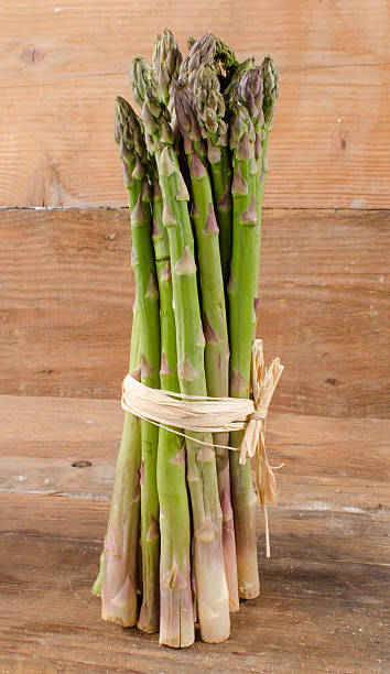 istock Bunch of fresh green asparagus 473335670