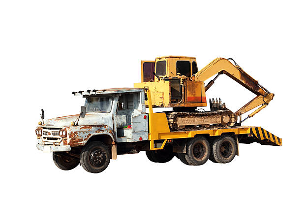 istock old truck transport excavator isolated 473336234