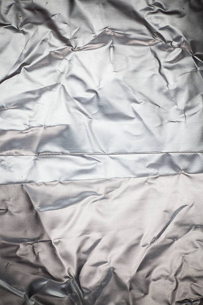 istock Crumpled aluminum foil background. 473341614