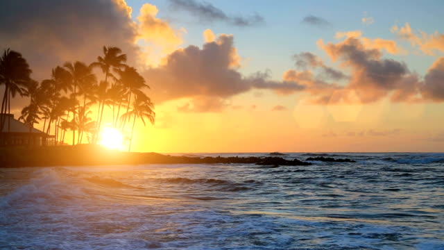 Sunrise over water in Kauai, Hawaii