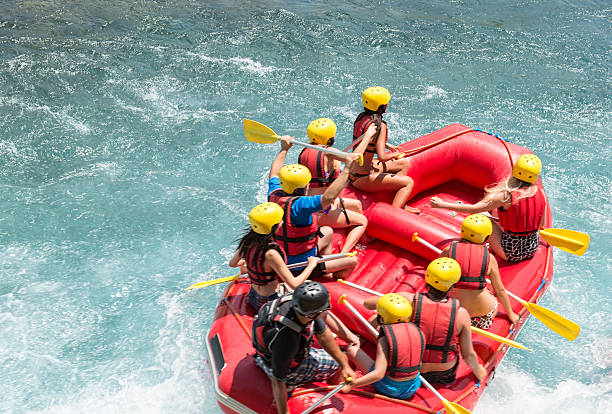 istock High angle view of people rafting on the river 473347562