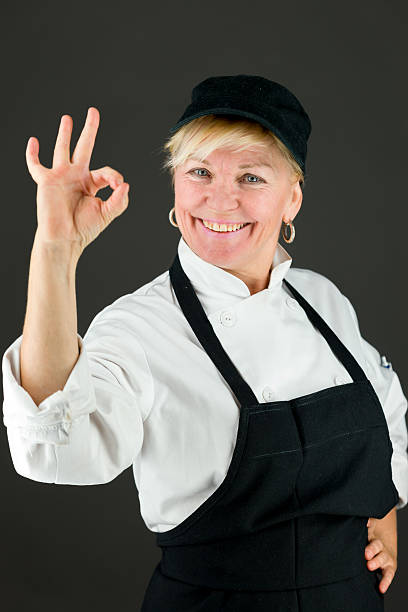 istock model isolated on plain background hand gesture ok sign 473350440