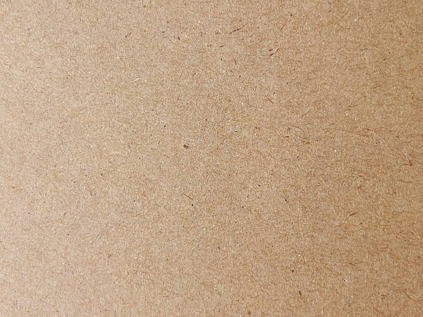 istock Brown wood fiber board texture background 473351250