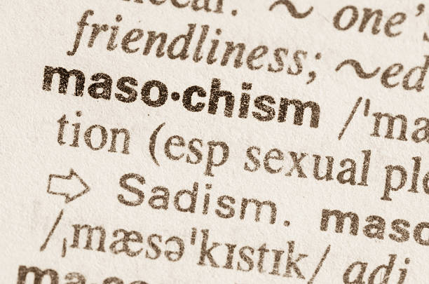 istock Dictionary definition of word masochism 473357440