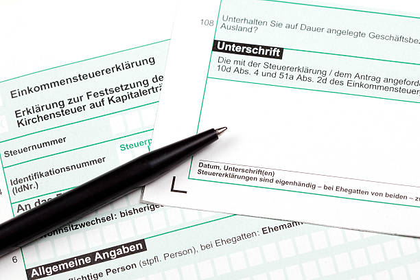 istock German tax form and pen - ready to sign 473359216