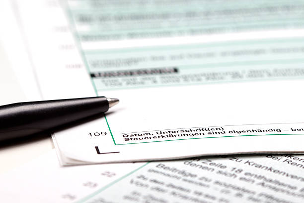 istock German tax form and pen - ready to sign 473359220