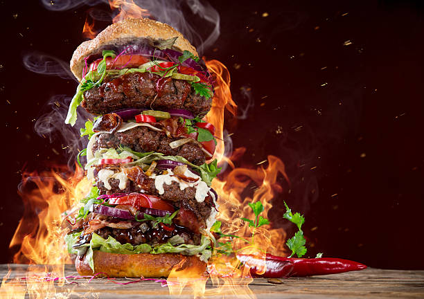 istock delicious big hamburger on wood 473360414