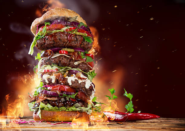 istock delicious big hamburger on wood 473360446
