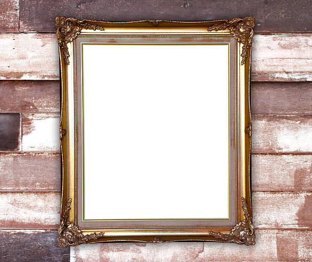 istock golden frame on wood wall background 473365532