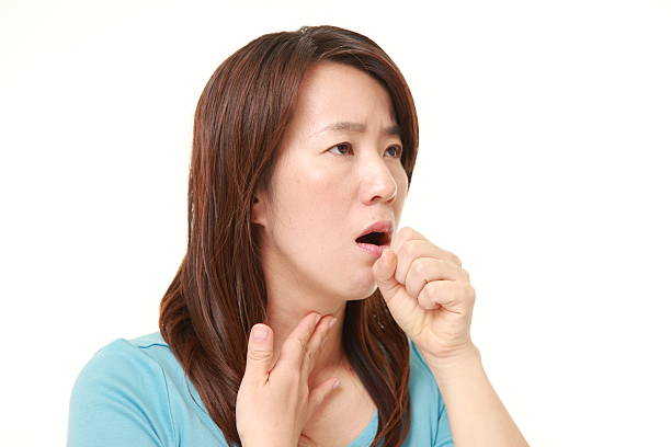 istock Japanese woman coughing 473367870