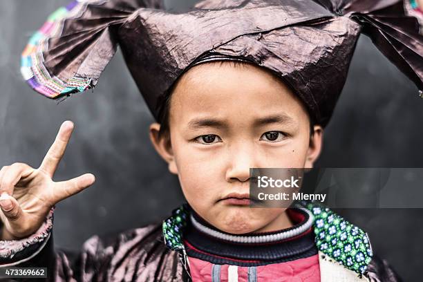Chinese Boy In Traditional Dong Clothing Stock Photo - Download Image Now - Child, Human Face, Indigenous Culture