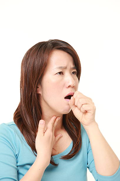 istock Japanese woman coughing 473374702