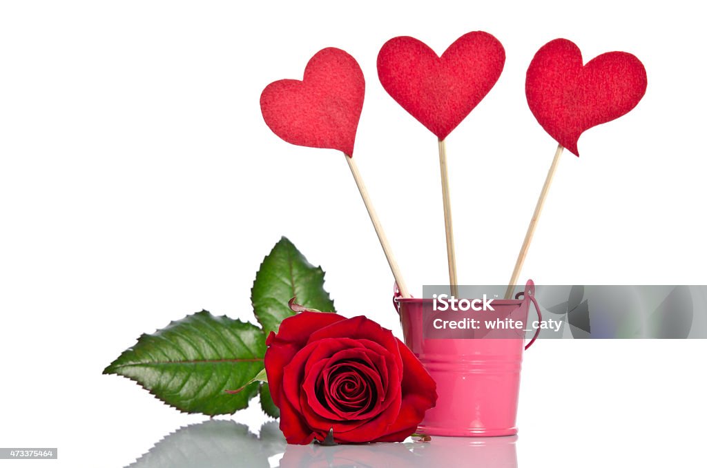 handmade skewers with cloth hearts and beauty red rose handmade skewers with cloth hearts and beauty red rose for celebration  on white background 2015 Stock Photo