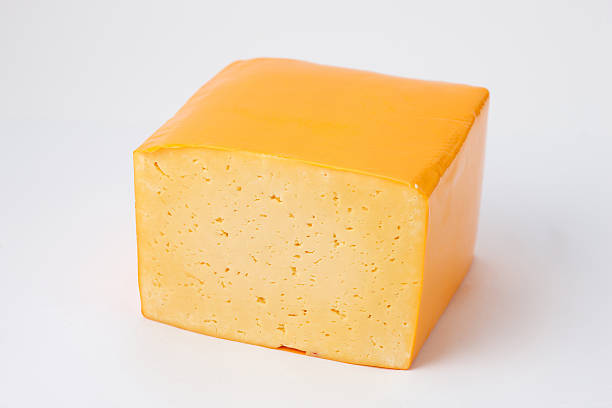 istock slab of cheese in vacuum packing 473379870