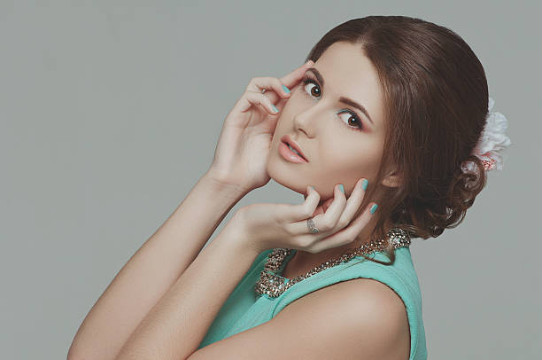 istock Beautiful woman with professional make up 473417258