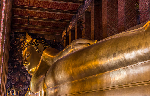 Seated Buddhas at the temple  Bangkok, Thailand.