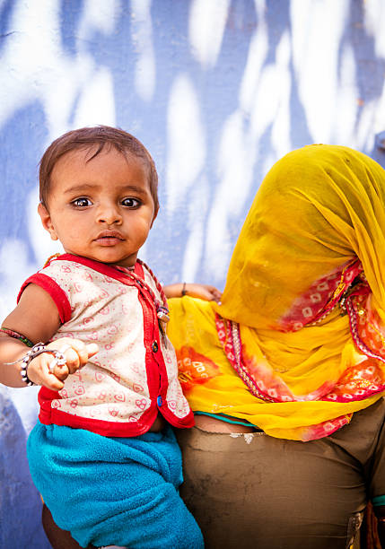 istock mother and child, India 473421084