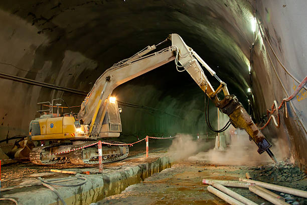 istock Hydraulic Hammer Excavator - Concrete Road Tunnel Construction 473421424