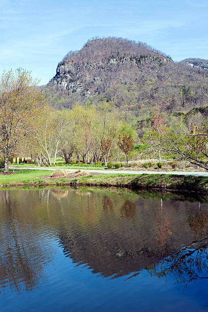 istock Reflection of a mountain peak in a lake 473421598