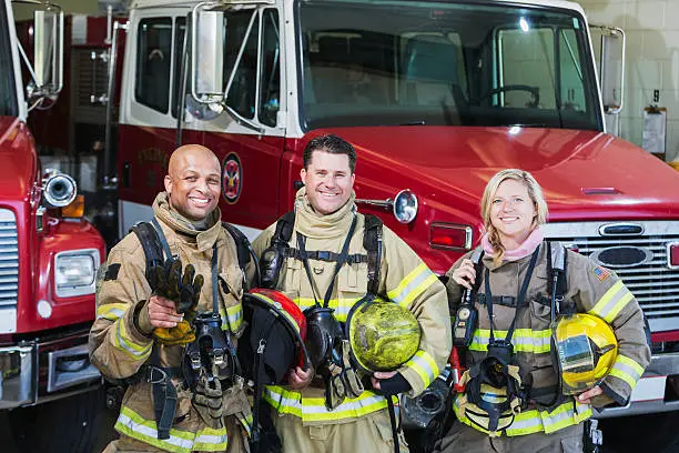 Photo of Diverse group of fire fighters at the station