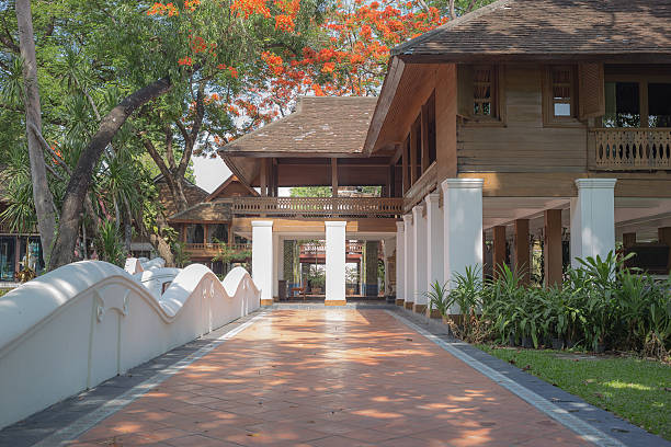 istock Wooden house and the tree 473422948