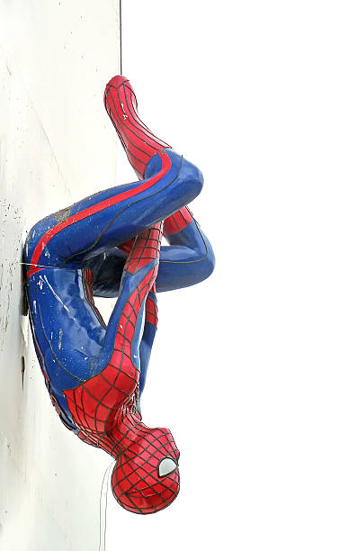 Spiderman Model Upside Down On Billboards Stock Photo - Download Image Now  - 2015, Activity, Art - iStock