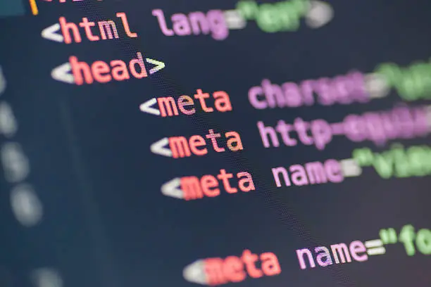 Photo of A close-up of HTML coding in bright colors