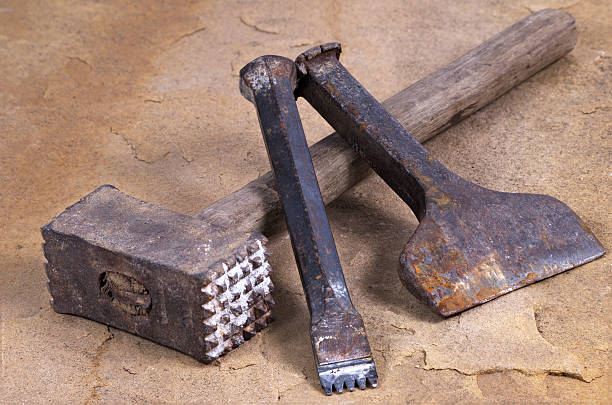 hammer with two chisels a hammer with two chisels chisel stock pictures, royalty-free photos & images