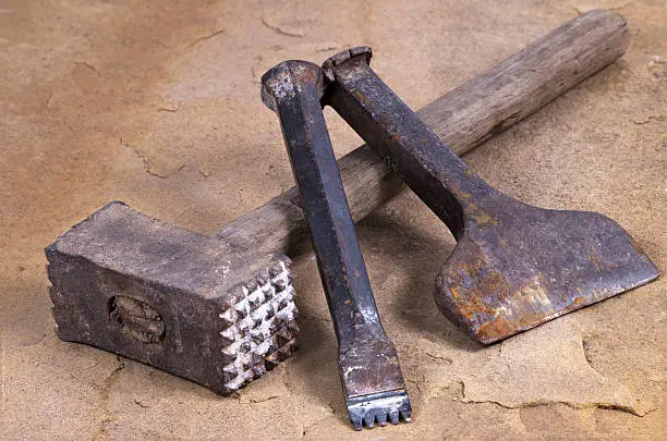 Photo of hammer with two chisels