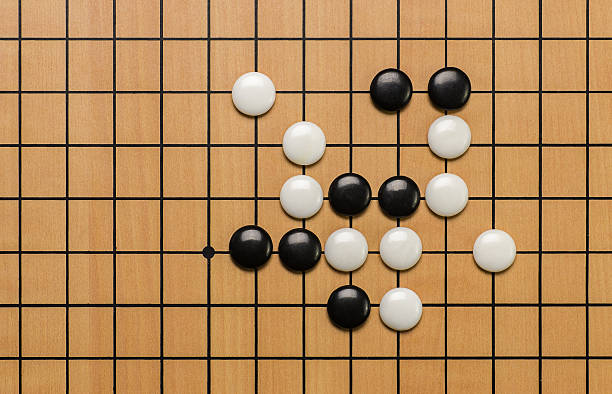 istock top view on stones on a Go board 473426518
