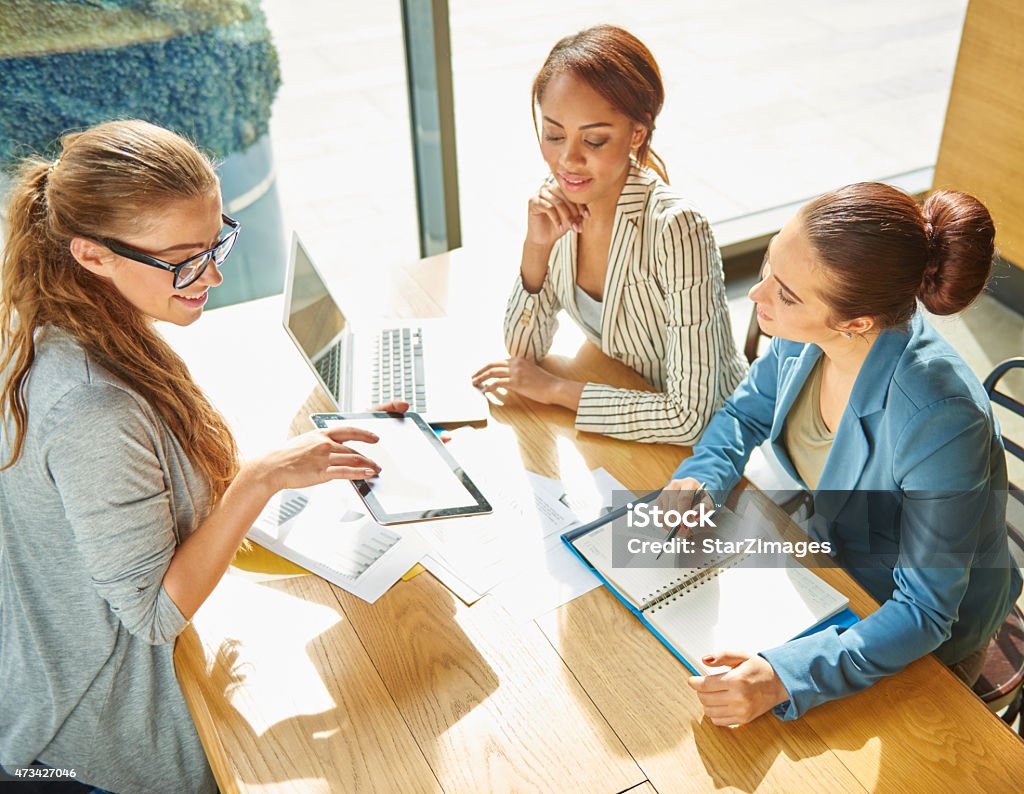 Working hard Portrait of young beautifull business woman Using Laptop Stock Photo