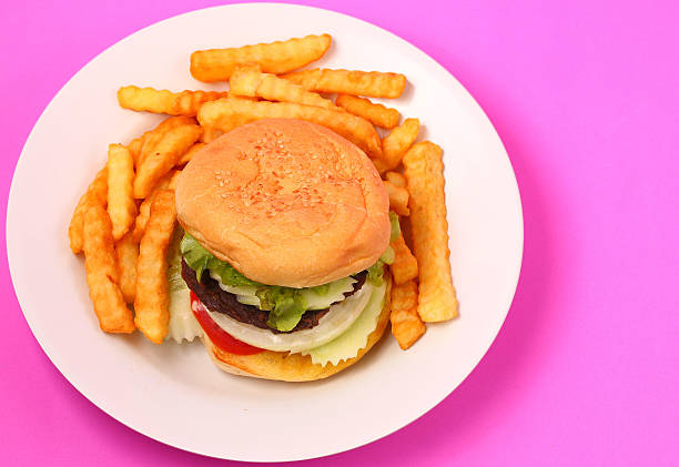 istock hamburger and french fries 473428062