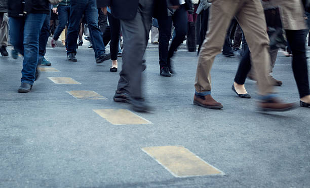 istock People crossing street, motion blur 473428208