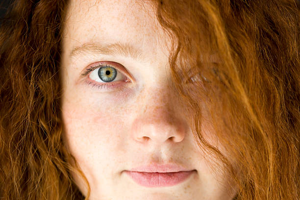 istock model isolated on black red hair 473436300