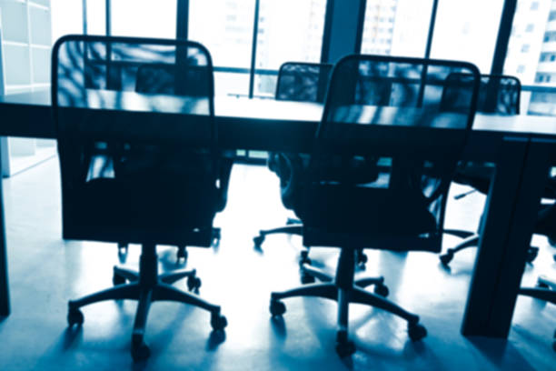 istock blurred background of of  table and chairs with sun light 473438332