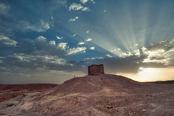 Sunset in the desert Beautiful sunset in Ait Benhaddou (Morocco), at the top of the hill. tower of god stock pictures, royalty-free photos & images