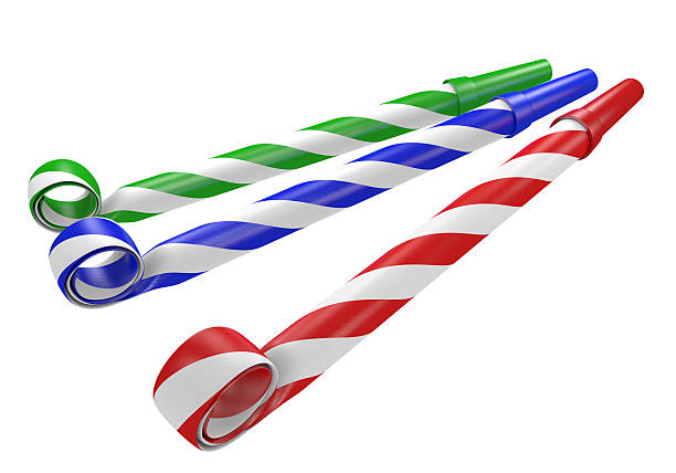 Striped red, blue, and green noisemaker party horns 3D render of colorful paper party blower horns for making noise. party blower stock pictures, royalty-free photos & images