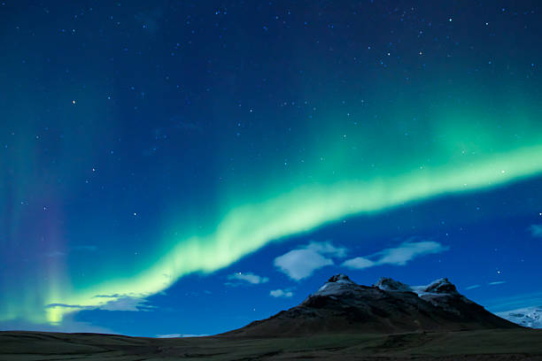 istock Northern lights over mountains in Iceland 473442344